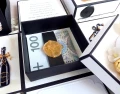 Exploding box z okazji 18 urodzin z ozdobną torebką w kolorach: biały, czarny, kremowy, złoty