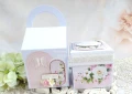 exploding box na chrzest w torebce z aniołkiem w kolorach: biały, ivory, różowy, zielony